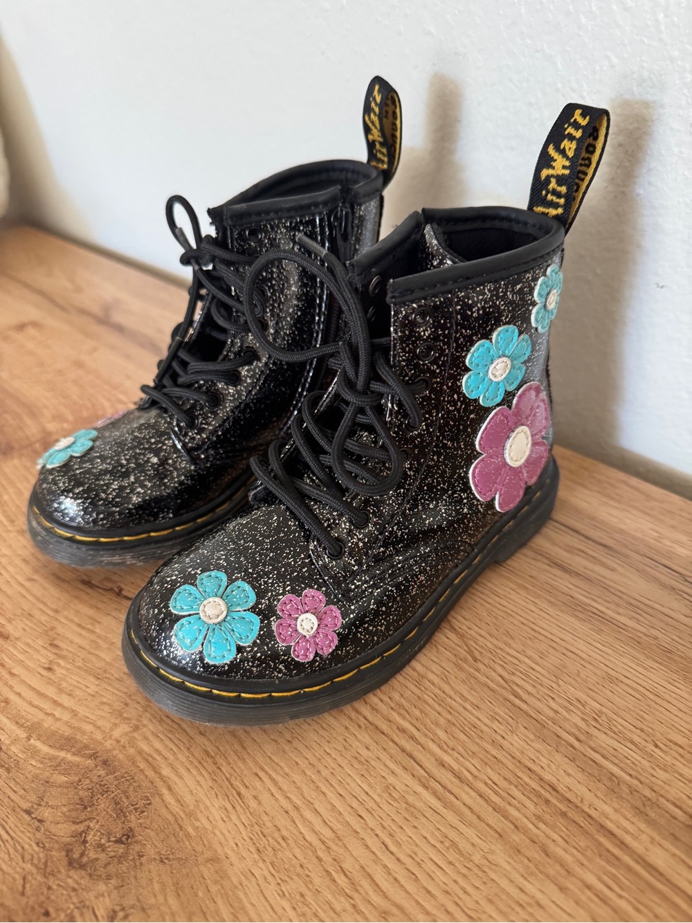 Dr. Martens Kids Black Glitter Boots with Pink & Turquoise Flower Appliqués